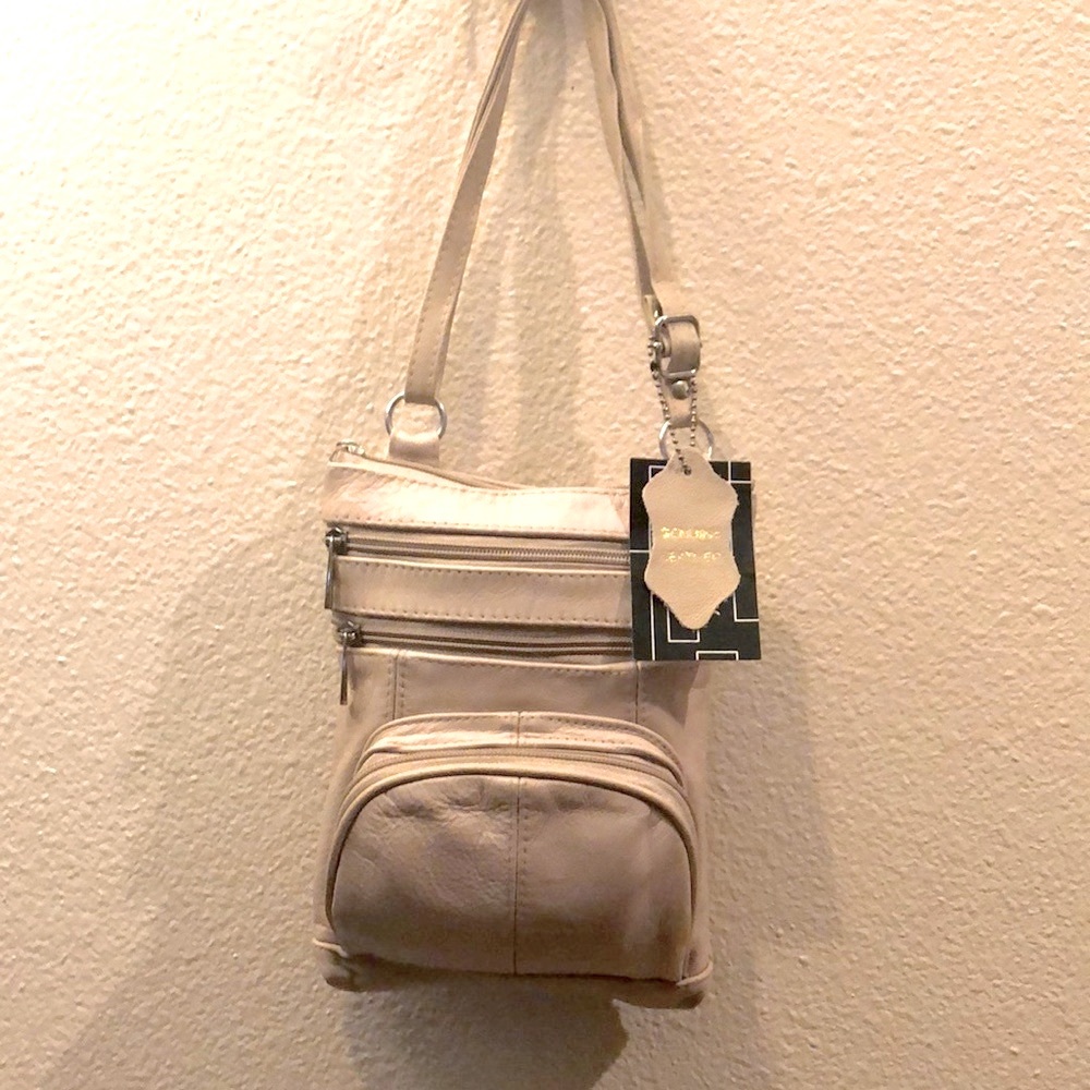 Real Leather cross body bag.